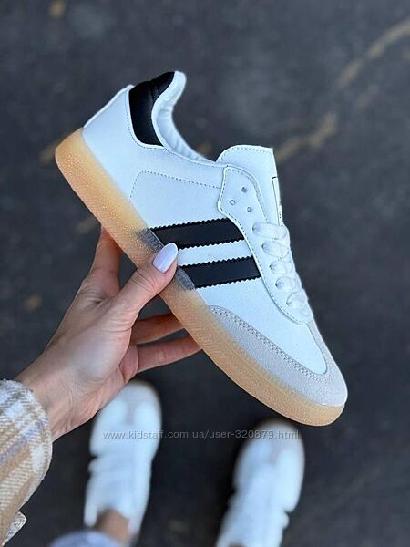 Жіночі шкіряні кросівки на низькій підошві