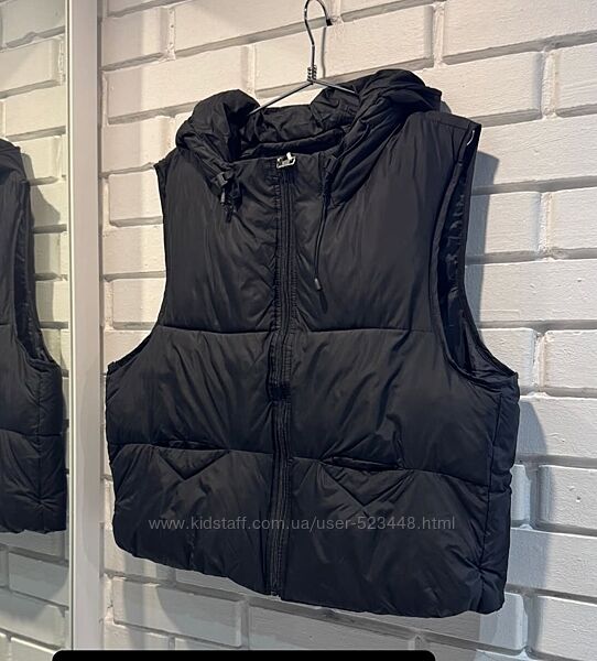 Жіноча жилетка