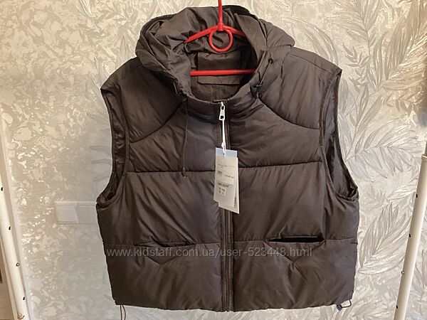 жіноча жилетка