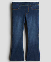 Розкльошені джини для дівчинки H&M.