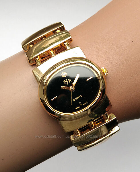 Bella Moda часы из США с камнем на циферблате мех. Japan SII