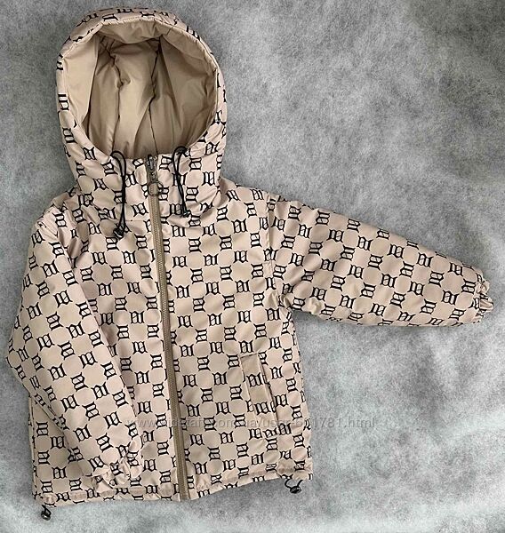 Подовжена  куртка для дівчаток виготовлена з якісної плащової тканини 