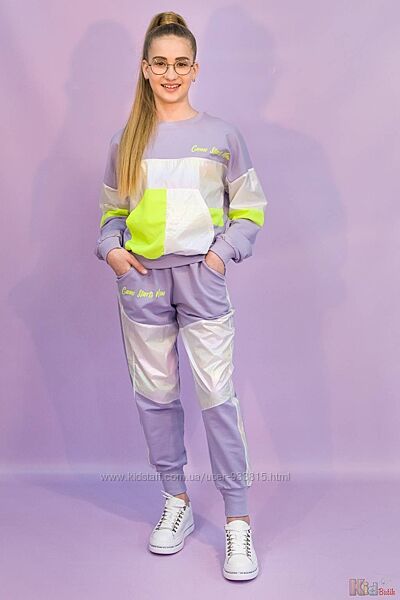 Штани для дівчинки спортивного стилю в бузковому кольорі Marions
