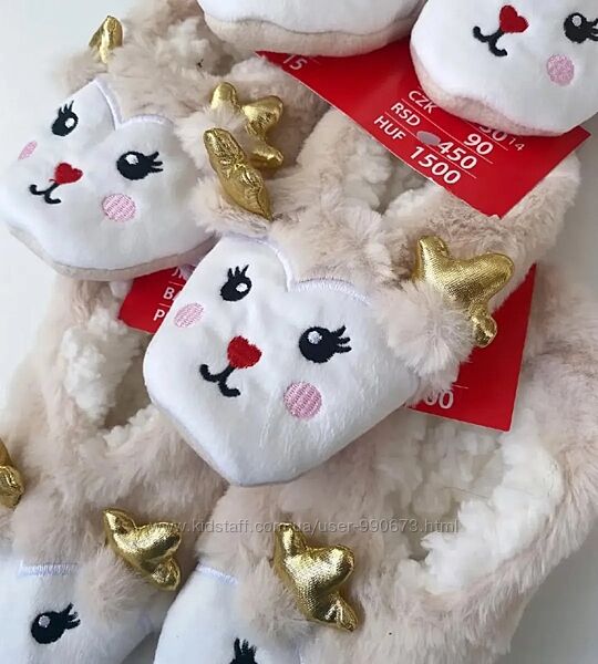 Кімнатні пухнасті капці сліди дівчатам