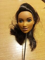 Голова Барбі