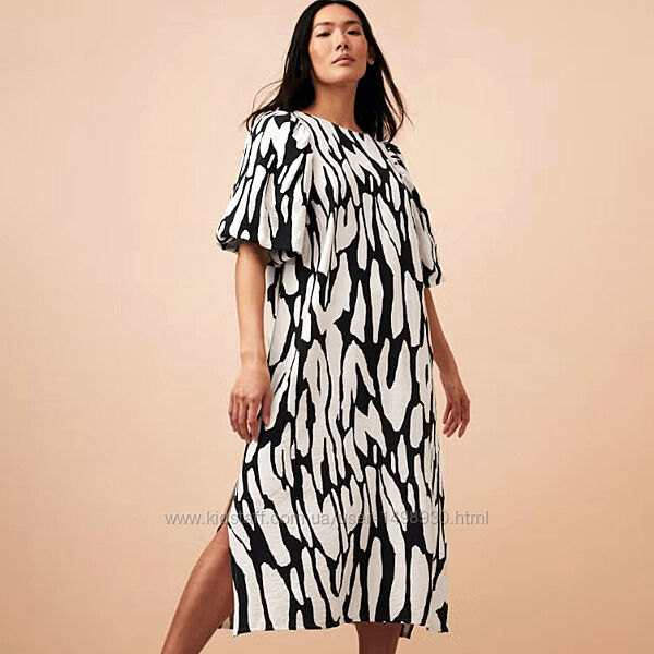 Ефектна чорно-біла сукня міді з пишними рукавами р.18