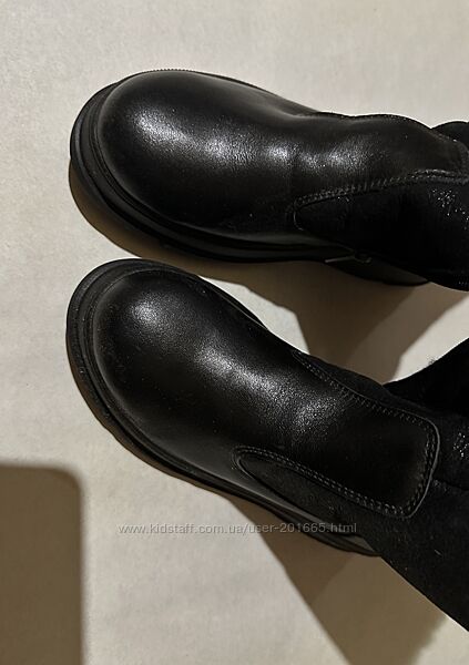 Кожаные ботинки.