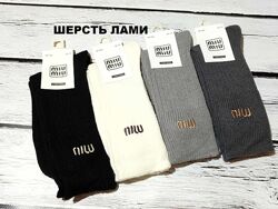 Теплі жіночі високі шерстяні вовняні шкарпетки в рубчик
