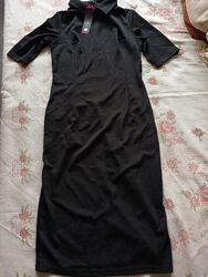 Сукня чорна по фігурі рукав 3/4 зі шліцею та з коміром