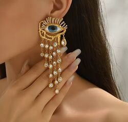 Оригинальные серьги необычного дизайна в виде глаз schiaparelli style