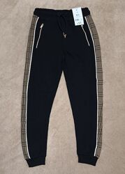 Нові утеплені штани на дівчинку George. 10-11 років