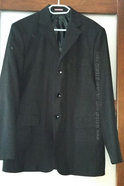 Мужской пиджак на выпускной свадьбу р. 52  Цвет - черный в тонкую полоску. 